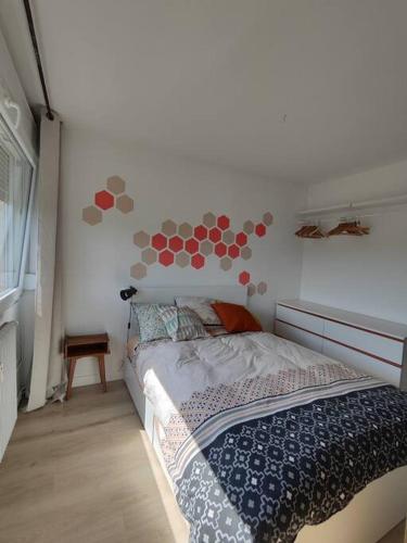 Katil atau katil-katil dalam bilik di Appartement en résidence