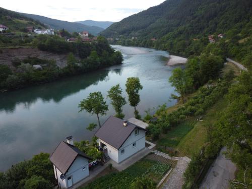an aerial view of a river with a house at Apartman na Drini in Foča