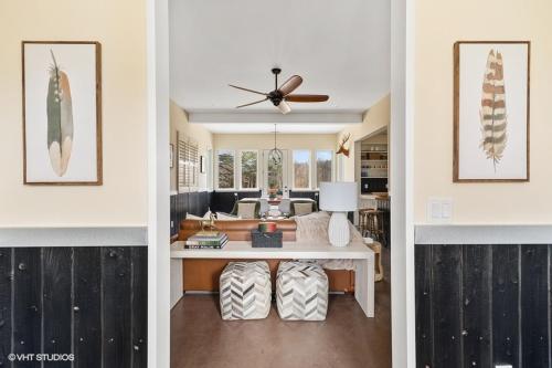 three views of a living room and dining room at The White Owl in Harbert