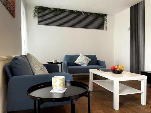 Posezení v ubytování 3 Bed House