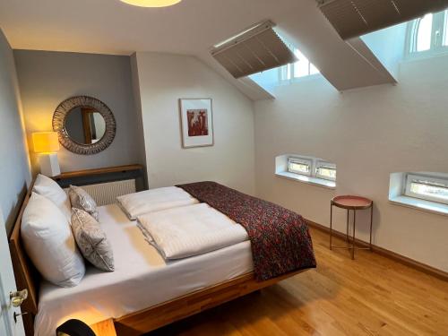 Ένα ή περισσότερα κρεβάτια σε δωμάτιο στο Ferienwohnung am Elisabethplatz