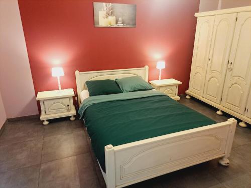 Postel nebo postele na pokoji v ubytování *Au Refuge Ardennais*