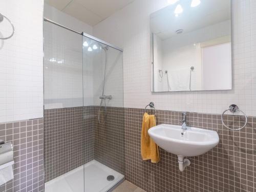 a bathroom with a sink and a shower at Spacious Holiday Home in Motril with 2 Large Terraces in Motril