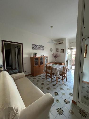 a living room with a couch and a table at A casa di Serafino in Formia