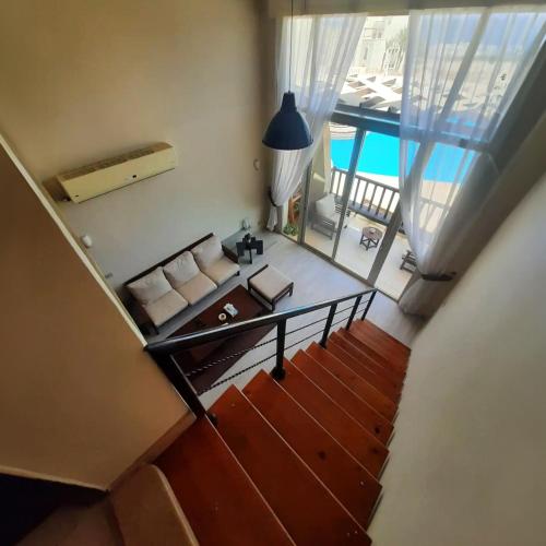 Posezení v ubytování Designer Loft mit grandiosem Meerblick am roten Meer