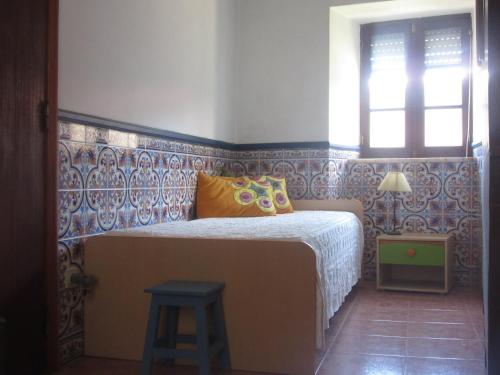 En eller flere senge i et værelse på Casa Eira do Povo 1