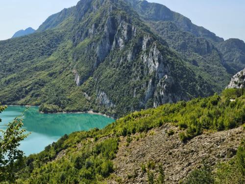 a mountain view of a lake in the mountains at Elona's Rooms in Krujë