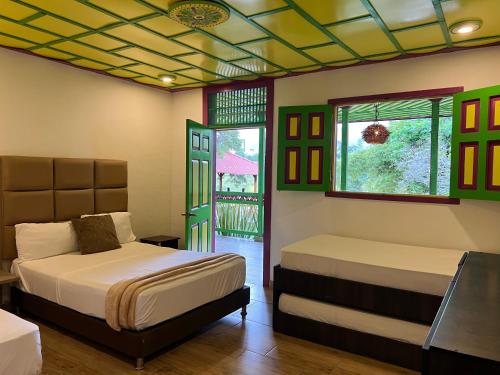 Postel nebo postele na pokoji v ubytování Dreams Hotel y Restaurante