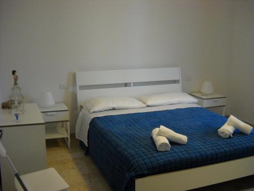 Krevet ili kreveti u jedinici u okviru objekta Casa Maddò