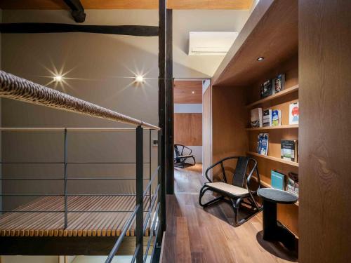 a house with a tennis court in a room at Kotohi Machiya House in Kyoto