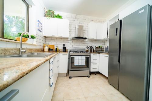 Dapur atau dapur kecil di A Guest Dream Villa Blue at Punta Cana Village