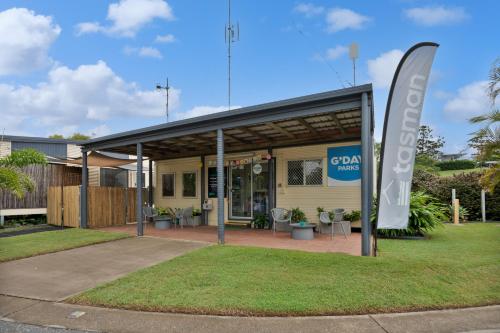 a building with a sign in front of it at Tasman Holiday Parks - Fisherman's Beach in Emu Park
