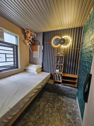 Postel nebo postele na pokoji v ubytování 榆迪賓館 YUTIK Guesthouse