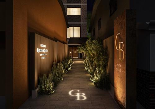 a hallway of a building with lights on the side at Hotel Grand Bach Kyoto Select in Kyoto
