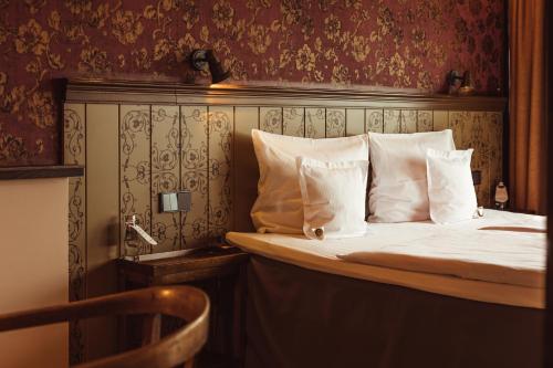 Postel nebo postele na pokoji v ubytování Promenade Hotel Liepaja
