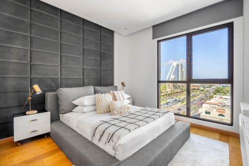 GuestReady - Coastal Living near Burj Al Arabにあるベッド