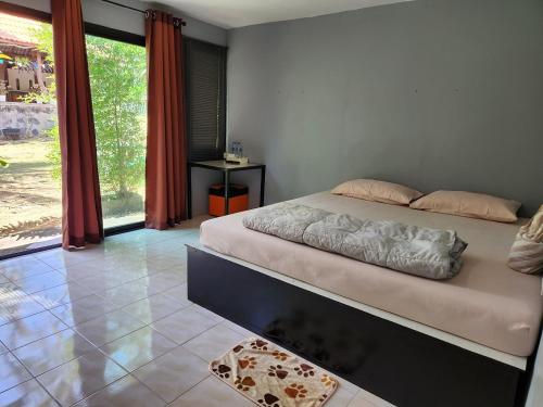 Postel nebo postele na pokoji v ubytování Relax Camp Resort Kaeng Krachan