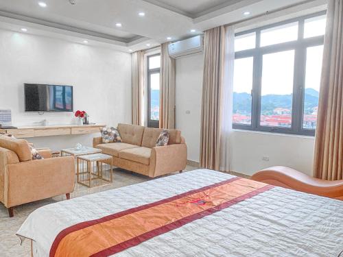 TV a/nebo společenská místnost v ubytování An Khang Hotel
