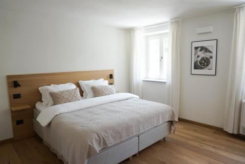 En eller flere senge i et værelse på Cascina Canelli