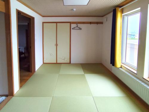 Imagen de la galería de White House Guesthouse, en Shiraoi