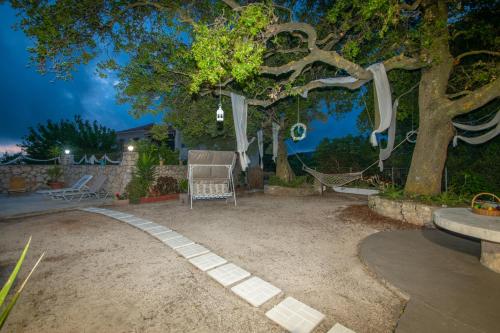Taman di luar Leandros Private House Near Shipwreck Beach by "elite"
