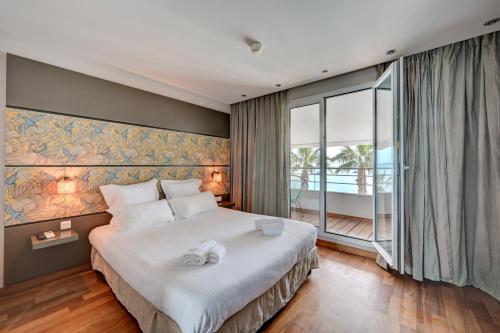 Postel nebo postele na pokoji v ubytování Hôtel Bor