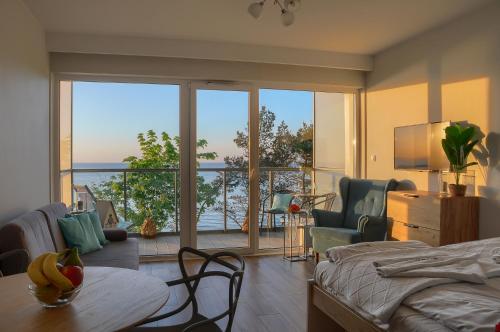 Zona d'estar a Apartament z widokiem na morze- USTRONIE APARTMENTS Nadmorski Luksus Apartamenty