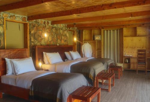 Postel nebo postele na pokoji v ubytování Alama Camp Mara