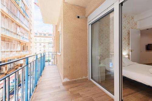 Postel nebo postele na pokoji v ubytování Malaga centro