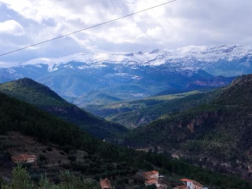 a view of a mountain range with snow covered mountains at Casas Rurales Carpe Diem in Yeste
