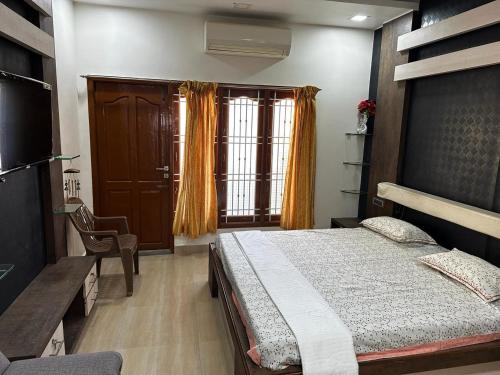 A bed or beds in a room at Temple View Home Stay