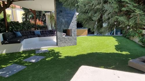 Zahrada ubytování Loft Garden Villa - 4 Br, 3 Ba, Sleeps 10, 7 min to downtown