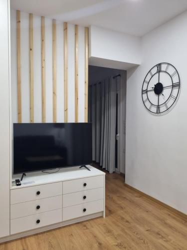 Apartment 34にあるテレビまたはエンターテインメントセンター