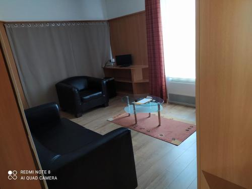 Posezení v ubytování Campus Hotel