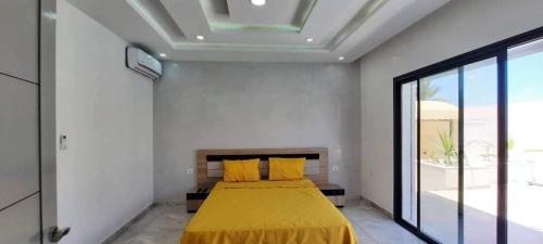 Postel nebo postele na pokoji v ubytování villa arij Djerba