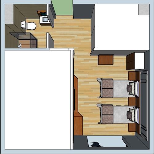 a floor plan of a small room with a bed at A Plus in Edirne