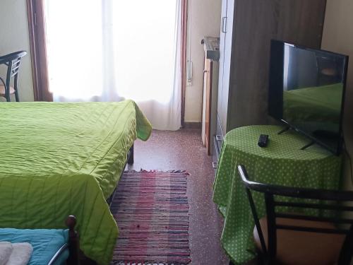 Ένα ή περισσότερα κρεβάτια σε δωμάτιο στο Hotel zakros rooms-restaurant