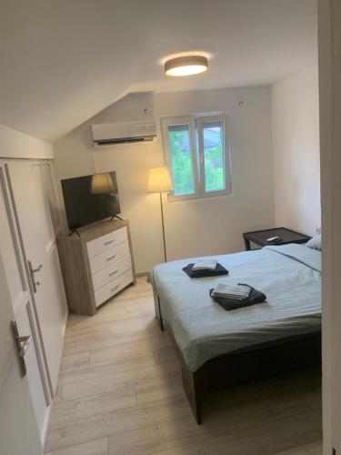 Postel nebo postele na pokoji v ubytování Mika’s Poolhouse