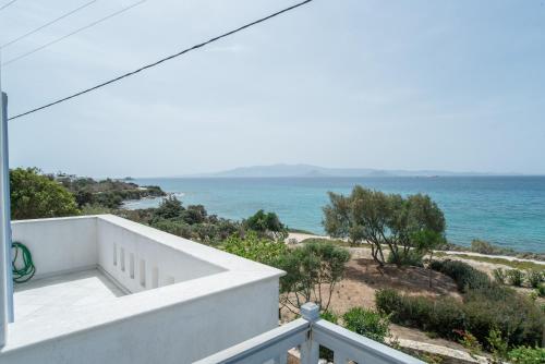 a view of the ocean from the balcony of a house at Orkos View House in Plaka