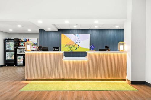 a lobby of a store with a reception desk at Spark by Hilton Lancaster Dutch Country in Lancaster