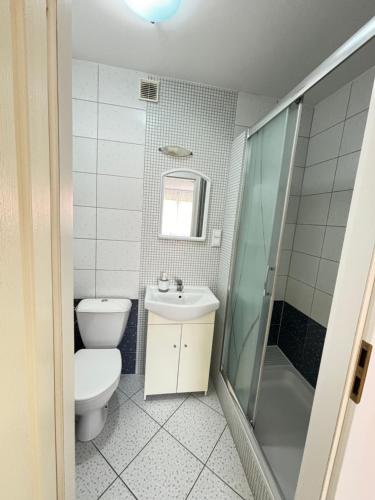 Kúpeľňa v ubytovaní Domino Dom Gościnny