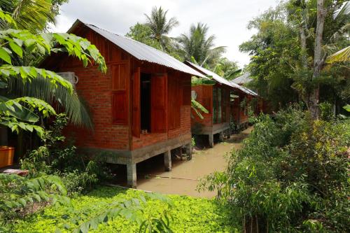 Κήπος έξω από το Homestay Nhà Của Gió