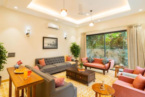 Zona de estar de ELIVAAS 4 BHK with Pvt Pool & Jacuzzi bathtub - Laguna Pulse