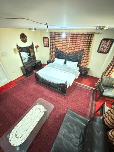 Gulta vai gultas numurā naktsmītnē Singay Homestay