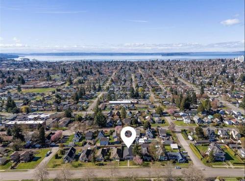 an aerial view of a town with a large white monument at Park and Mountain View, near Downtown Everett, Boeing in Everett