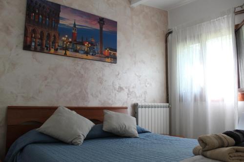 Postel nebo postele na pokoji v ubytování Appartamenti Da Michela