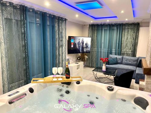 Χώρος καθιστικού στο GALAXY SPA - Suite Neptune Jacuzzi et Sauna Privatif