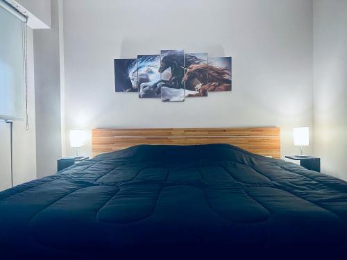 Un pat sau paturi într-o cameră la Luciana Palermo Soho