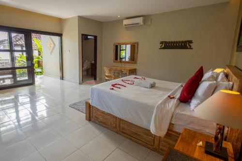 Ένα ή περισσότερα κρεβάτια σε δωμάτιο στο Sunshine Bungalows