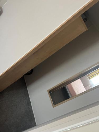 a counter top with a window in a room at Arthurs Pad WB in Whitley Bay